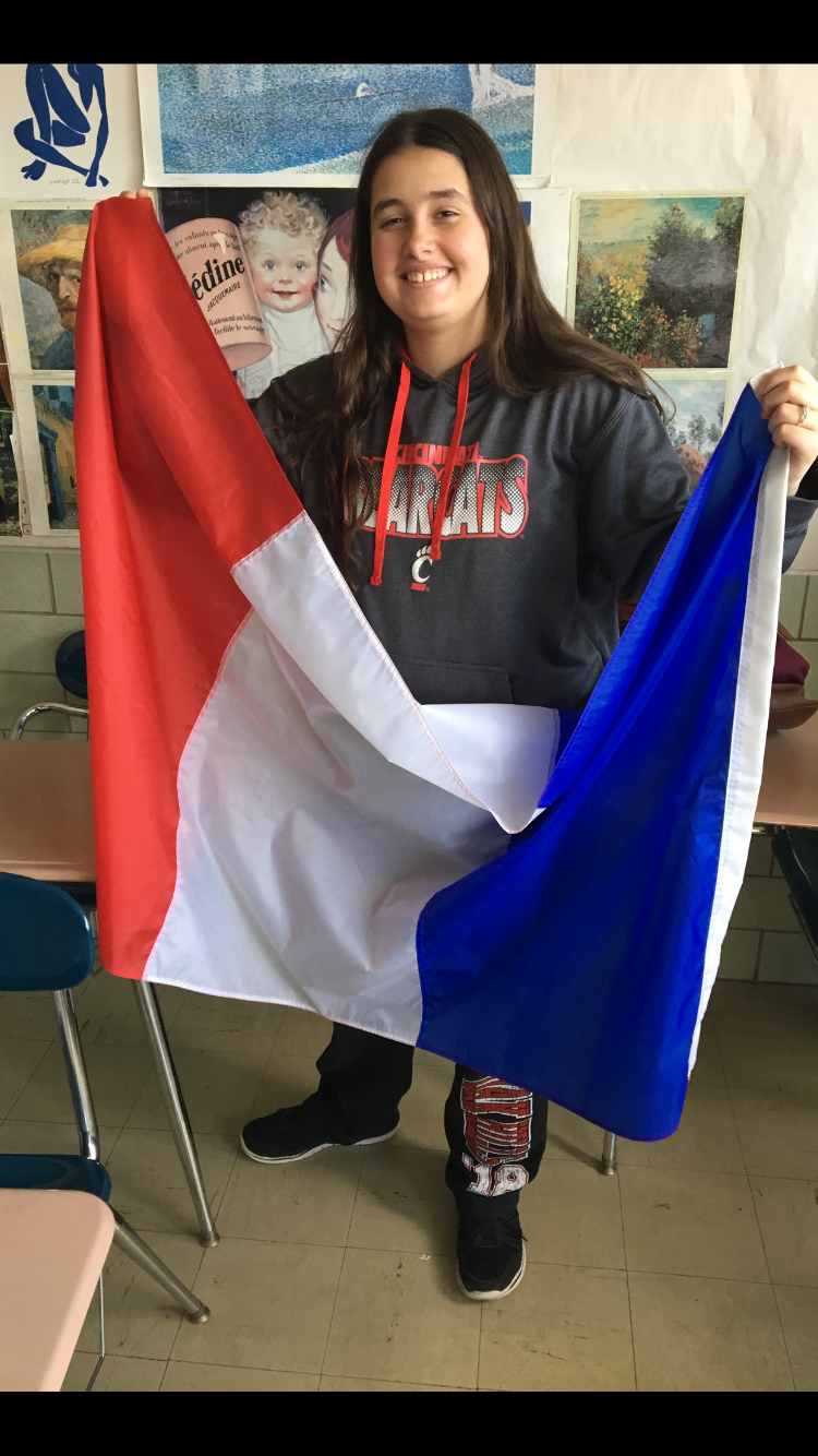 Photo of Jessica Morgan with French flag